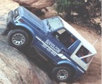 image of a vehicle ascending a steep slope